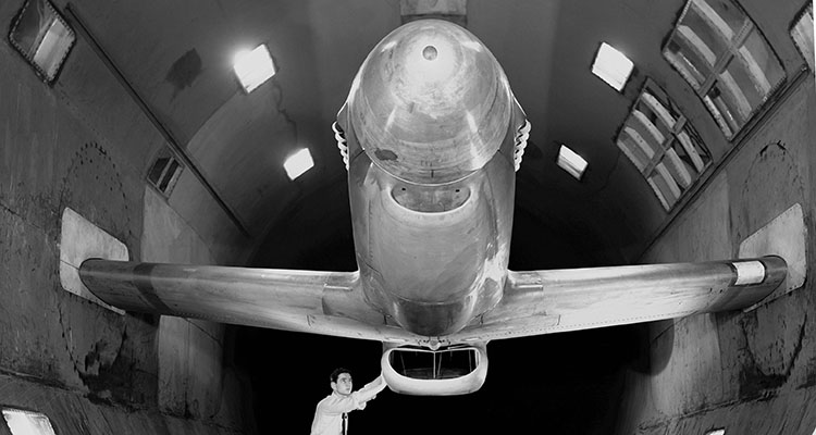 Wood model of P-51 in wind tunnel